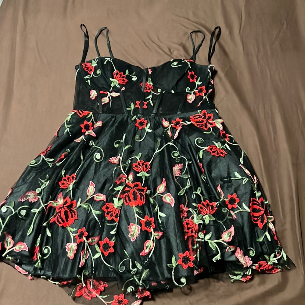 Black and flowers dress, short, not stretchy. Size 15/16